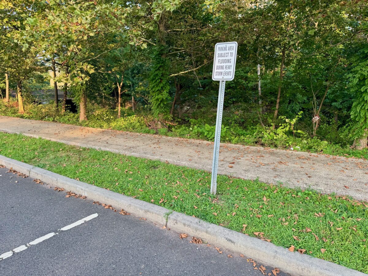 Rahway Neighbors Fight for Fair Parking at Housing for Artists and Veterans 3 Flood hazard sign posted at Hamilton Stage parking lot near Rahway River