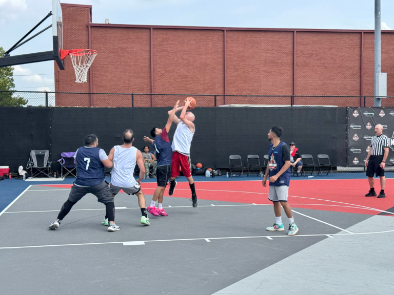 Players from the 30+ division battle on the court during a Mayor’s Cup basketball game in Rahway.