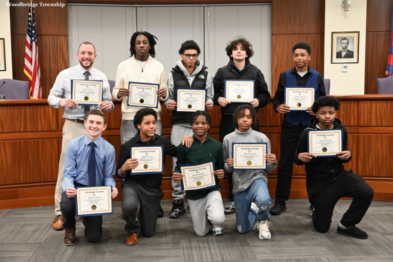 Avenel Middle School boys basketball team celebrates undefeated season at Woodbridge Town Hall.