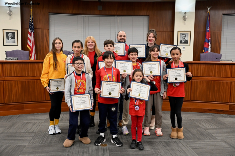 Crimson Knights youth cross country team honored in Woodbridge after national championship win.
