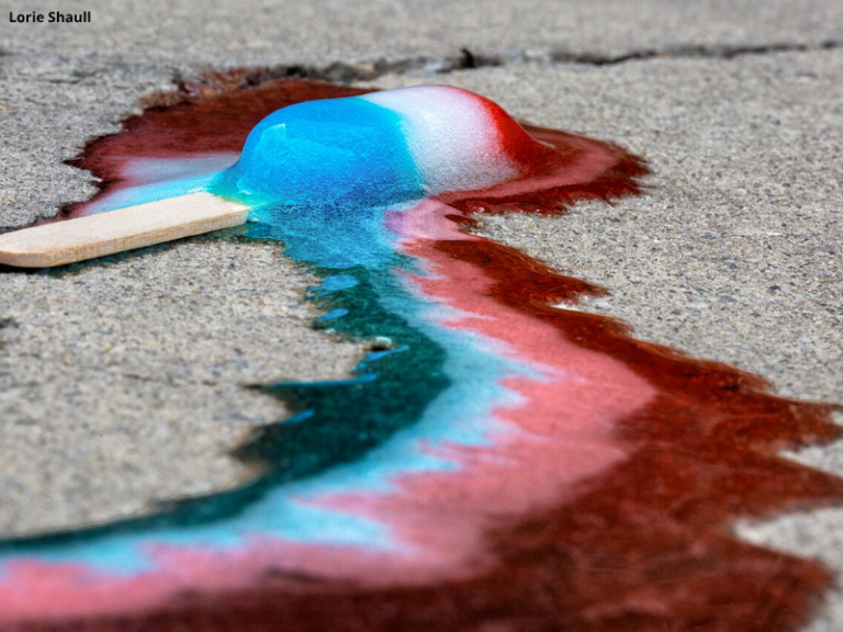 Bombs Away! A melting Bomb Pop on a sidewalk means one thing....hot weather! And maybe also a crying child.